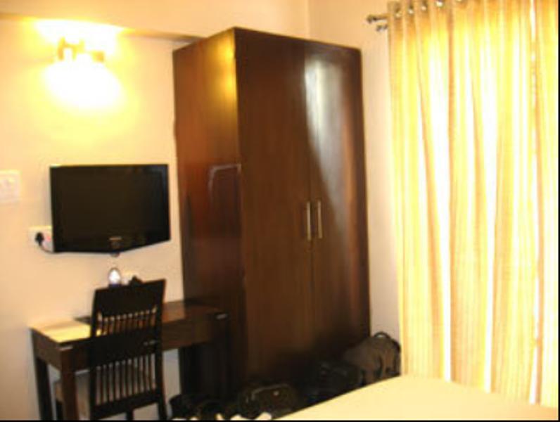 Hotel The Elite Suites Pune Værelse billede