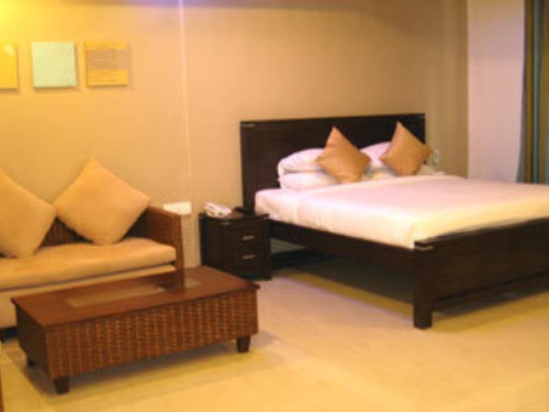 Hotel The Elite Suites Pune Værelse billede
