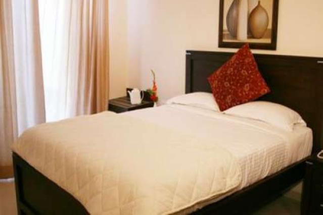 Hotel The Elite Suites Pune Værelse billede
