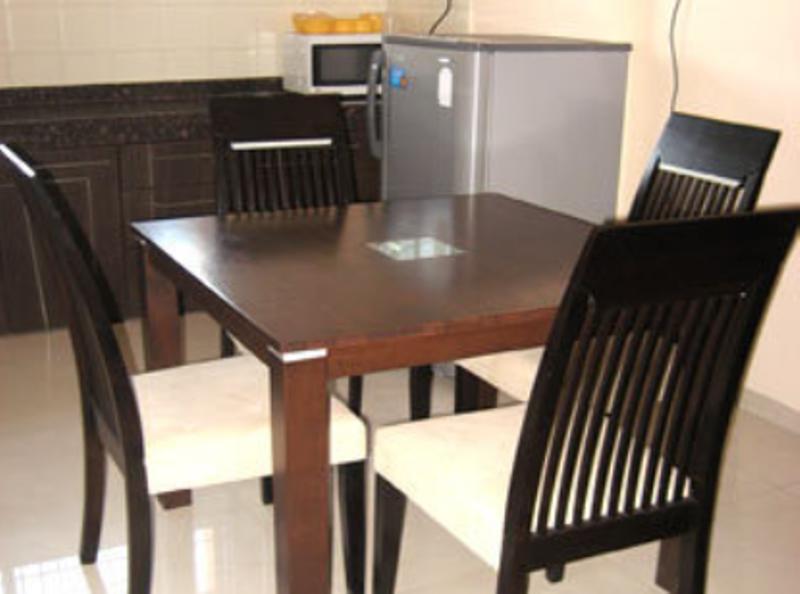 Hotel The Elite Suites Pune Værelse billede