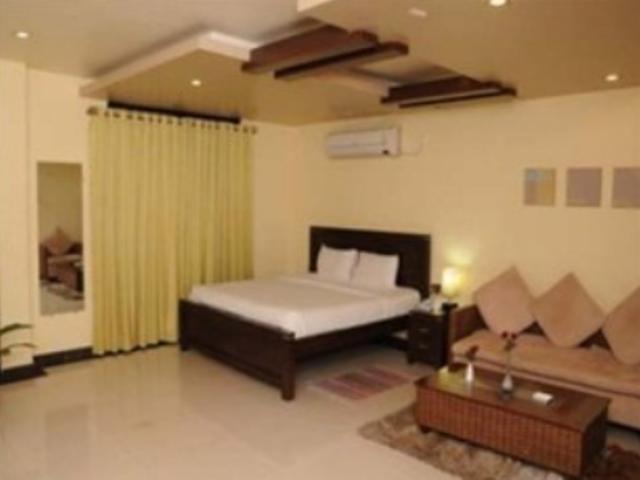 Hotel The Elite Suites Pune Værelse billede