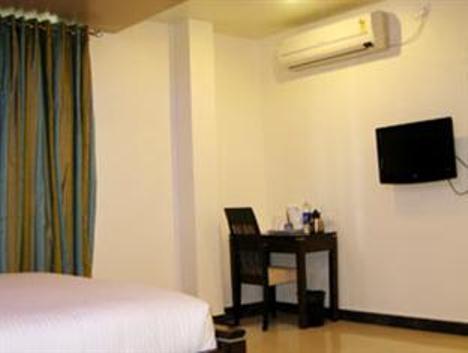 Hotel The Elite Suites Pune Værelse billede